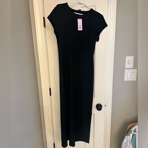 New with tags, long fitted black dress